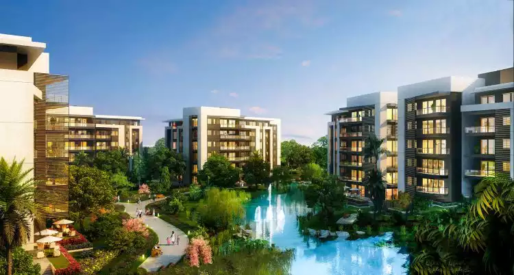 Madinaty apartment buildings with green lawns